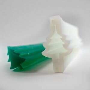 Silicone christmas tree tube mould shown with soap made using the mould.