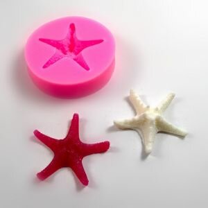 Silicone starfish mould shown next to soap made using the mould.