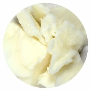 A close up of a white thick butter to show how Monoi de Tahiti looks